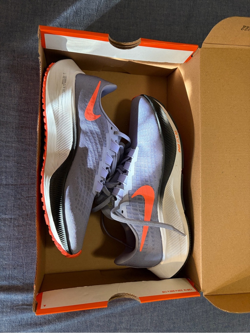 Nike Women’s Sneakers - Light Purple with Orange Swoosh
